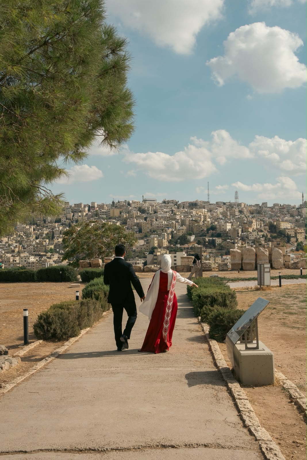 Yaman and Leanne holding hands overlooking Amman